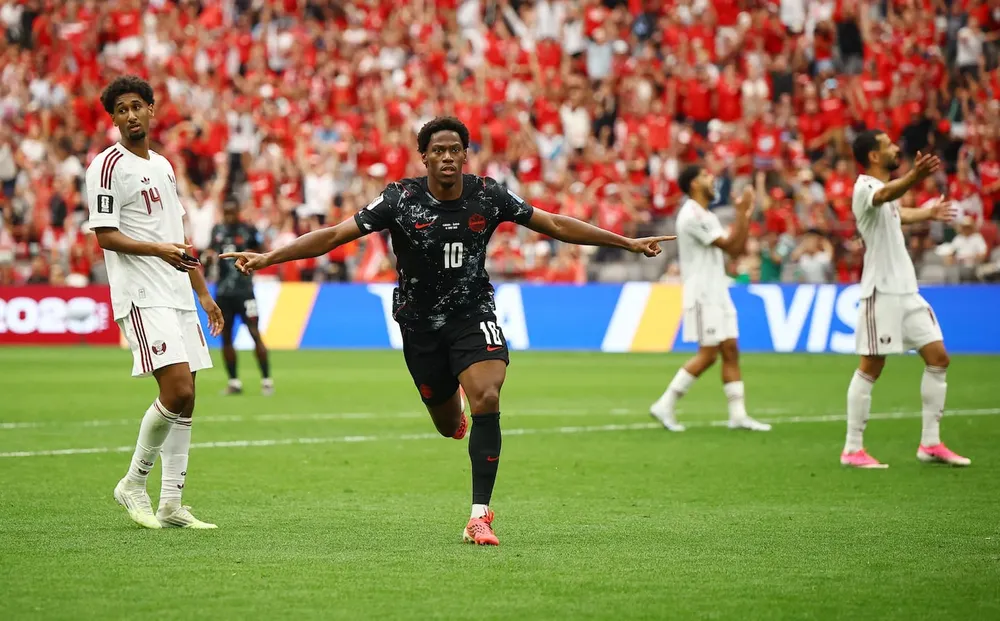 soccer-football-fifa-world-cup-2026-group-b-canada-v-qatar-bc-place-vancouver-canada-june-18-2026-canadas-jonathan-david-celebrates-scoring-their-second-goal-reutersagustin-marcarian-J6BX2I2P2QOTXUGEPF37B3U6LI